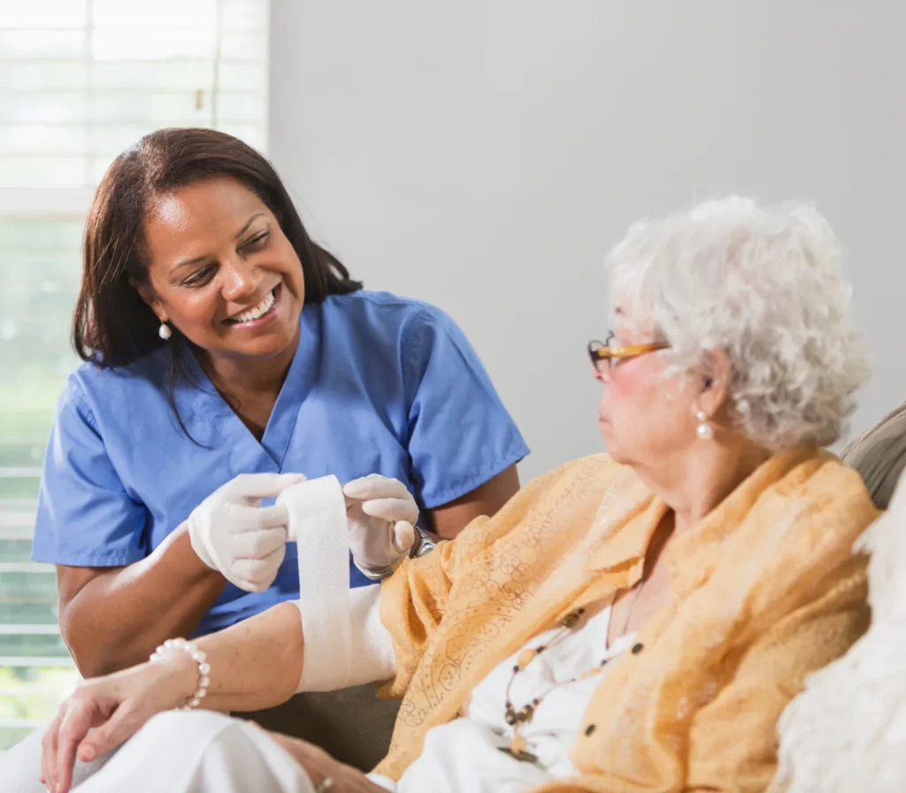 Nurse providing care to senior woman