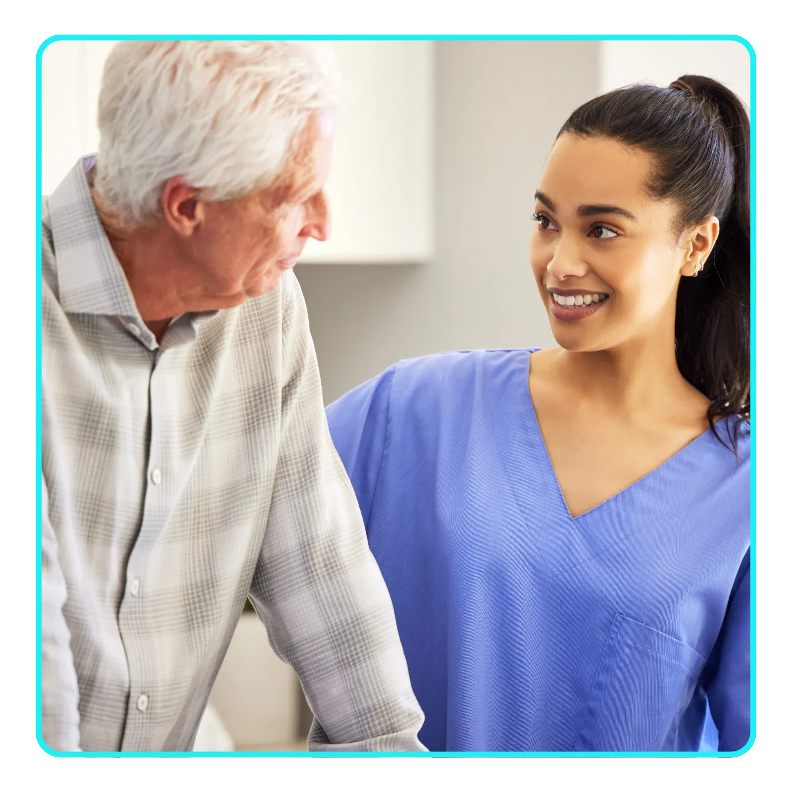 Nurse smiling at elderly male patient