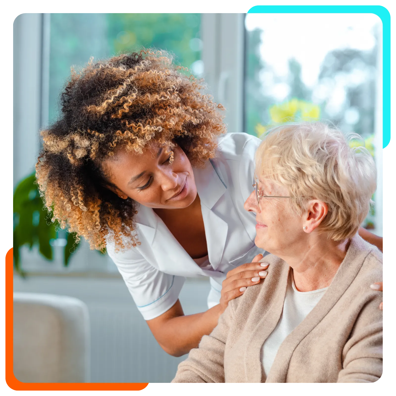 Caregiver assisting elderly woman at home
