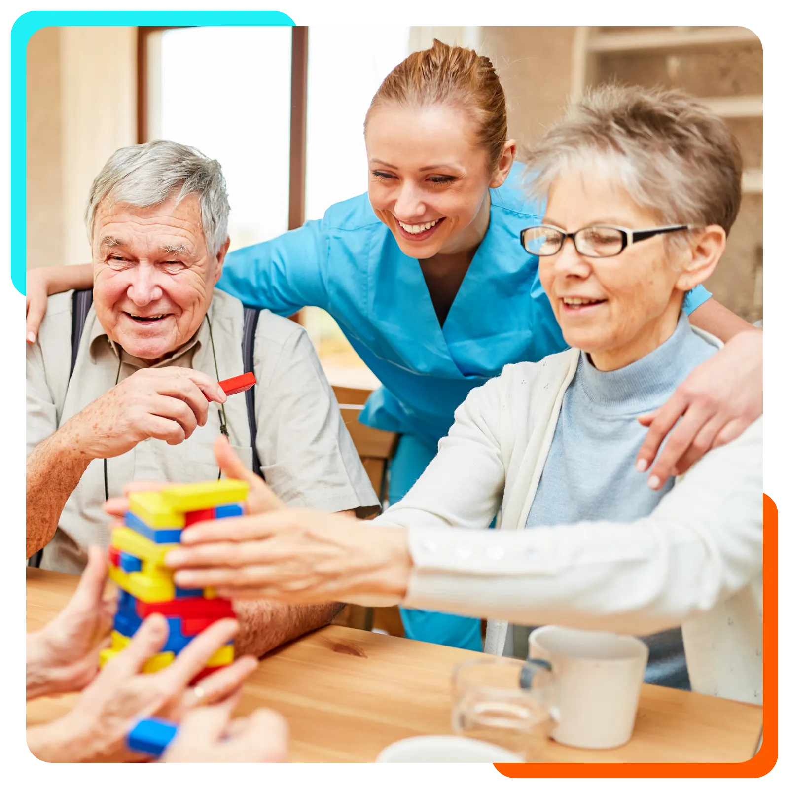 Caregiver assisting elderly with stacking blocks