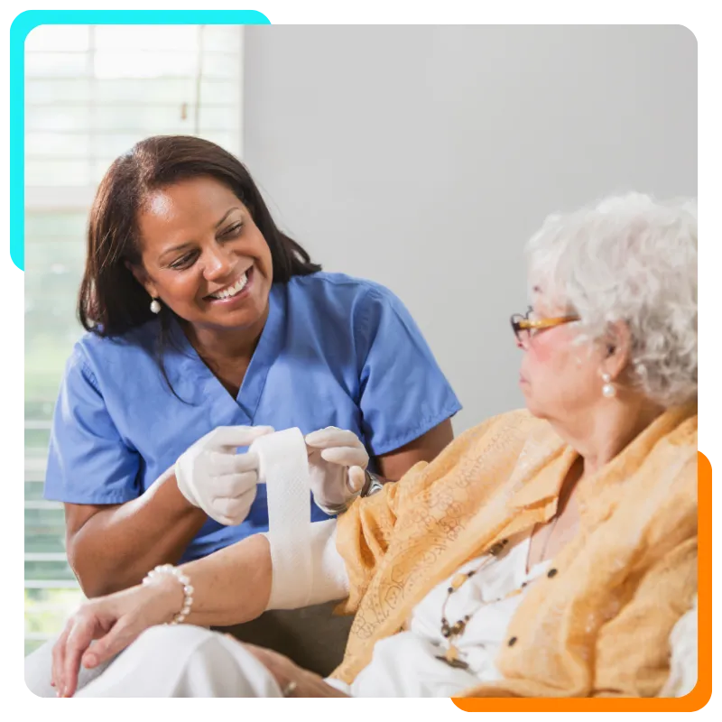 Nurse applying bandage to patient's arm