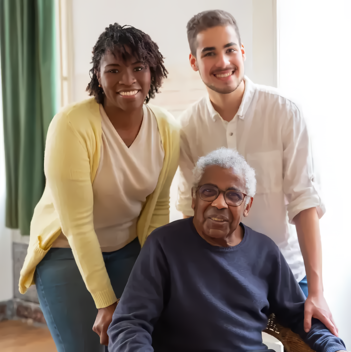 Three smiling people posing at home