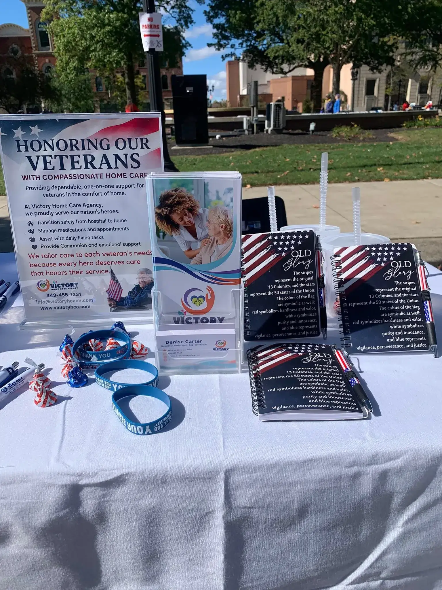 Veterans information table with brochures and wristbands